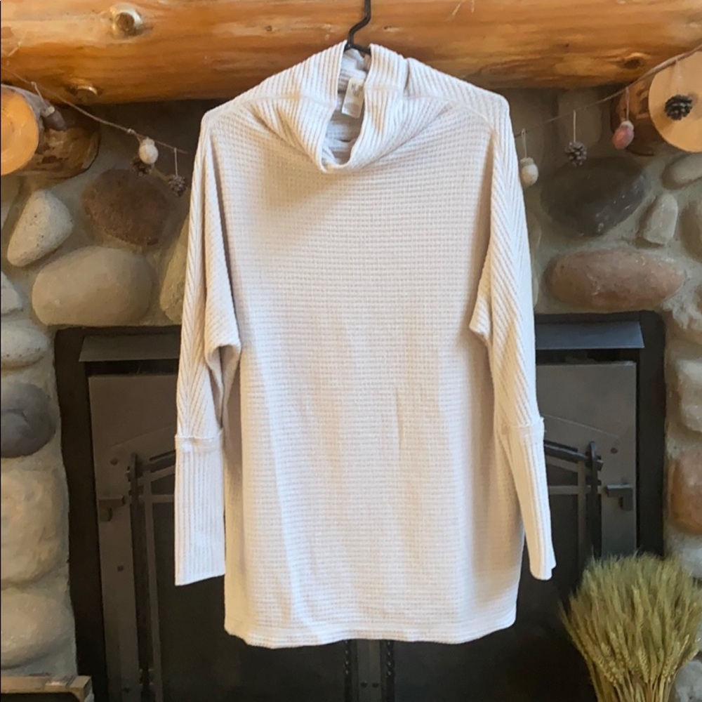Cream colored waffle pattern long sleeve tunic
